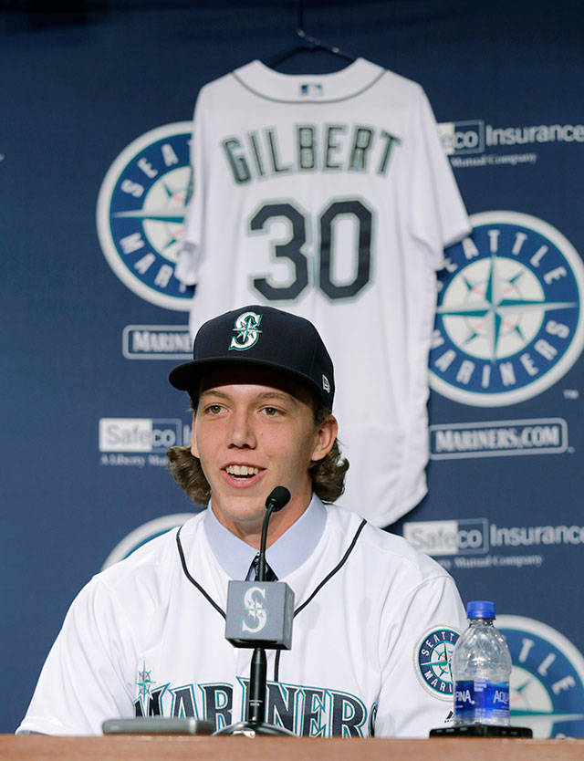 Seattle Mariners first-round draft pick Logan Gilbert is introduced at a news conference before the Mariners game against the Boston Red Sox on Saturday, June 16, 2018, in Seattle. (John Froschauer / Associated Press)
