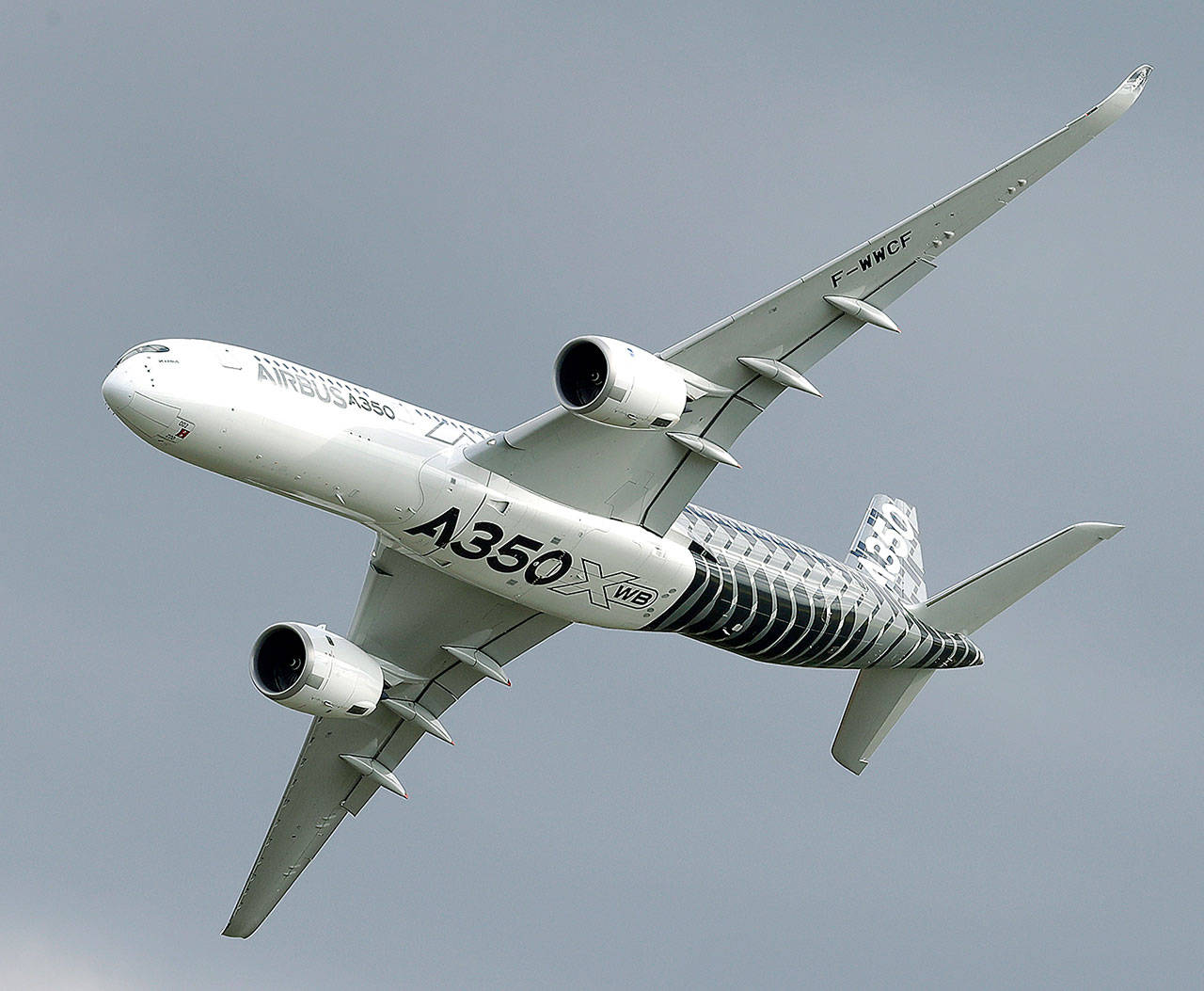 An Airbus A350 flies during the ILA Berlin Air Show in Berlin, Germany, on April 25. Aviation giant Airbus has threatened to leave Britain if the country leaves the European Union without an agreement on future trading. (AP Photo/Michael Sohn, File)