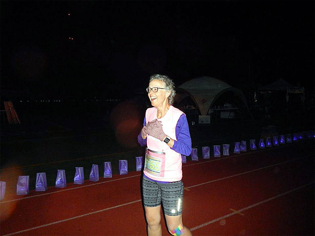 Carla Stewart reaches the finish line of the Monroe Relay for Life at about 3 a.m. June 2. (Contributed photo)