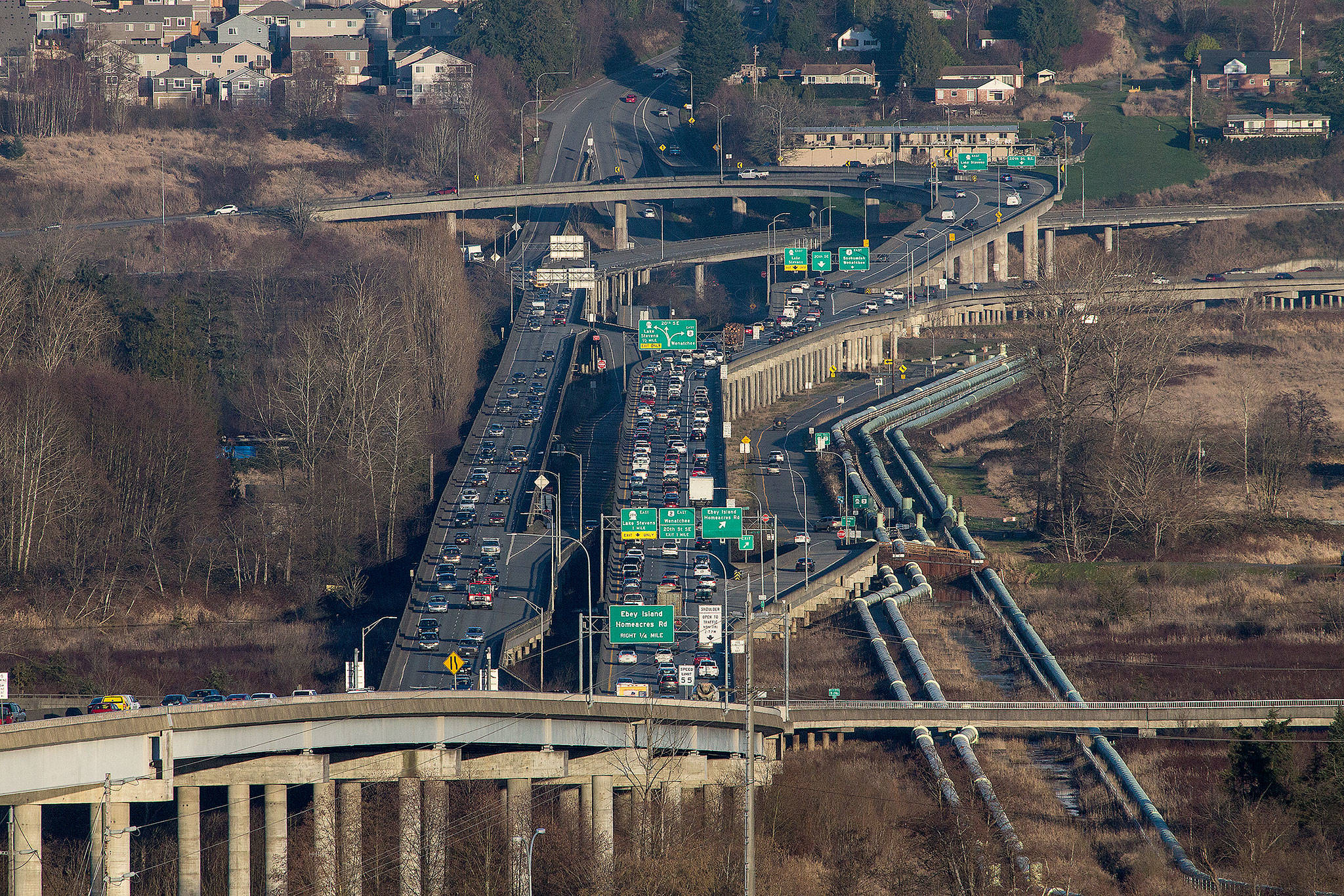 This view is looking east from Everett toward the U.S. 2 trestle as cars begin to backup in March 1. (Andy Bronson / The Herald)