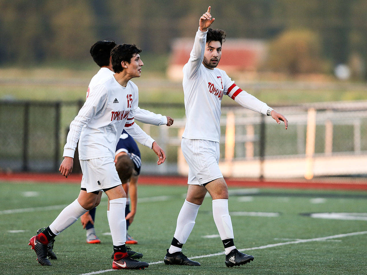 Marysville-Pilchuck’s Daniel Amador points to the stands after scoring a goal as Marysville Pilchuck beat Arlington 3-2 in a boys’ soccer match and clinched the Wesco 3A title on Tuesday, May 1, 2018 in Marysville. (Andy Bronson / The Herald)