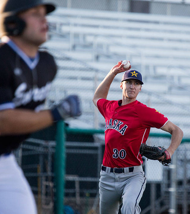 Alaska’s Cameron Leonard throws out Everett’s Evan Johnson at Everett Memorial Stadium on Tuesday. (Andy Bronson / The Herald)