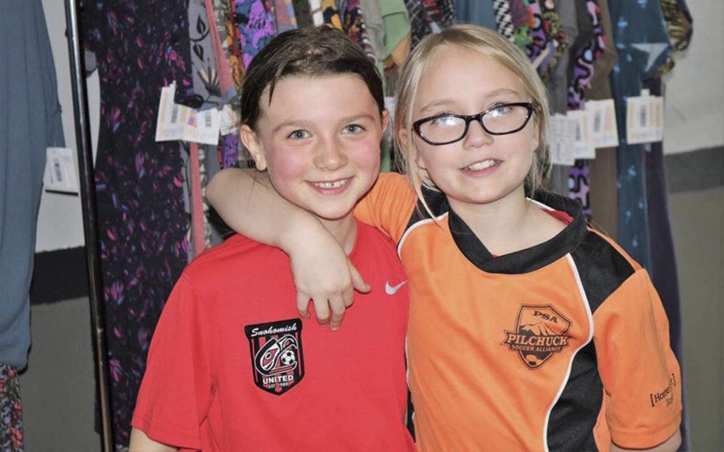 Phenyx Andolsek (left) was diagnosed with a rare cancerous tumor in her skull in 2016. This year her friend Zoe Bennett, 10, has been baking and selling dog treats to help Phenyx’s family with medical bills. (Bennett family)
