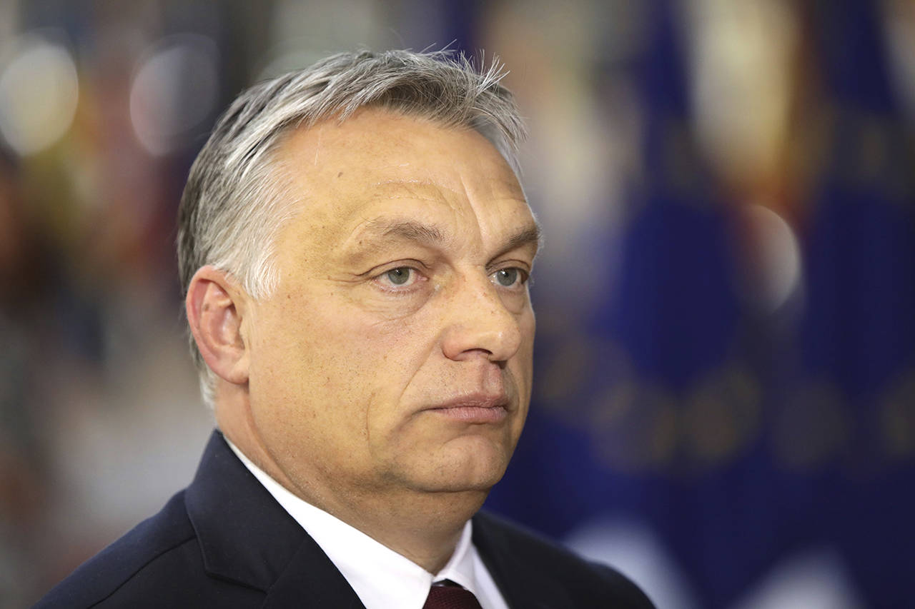 Hungarian Prime Minister Viktor Orban arrives for an EU summit at the Europa building in Brussels on Thursday. (AP Photo/Olivier Matthys)