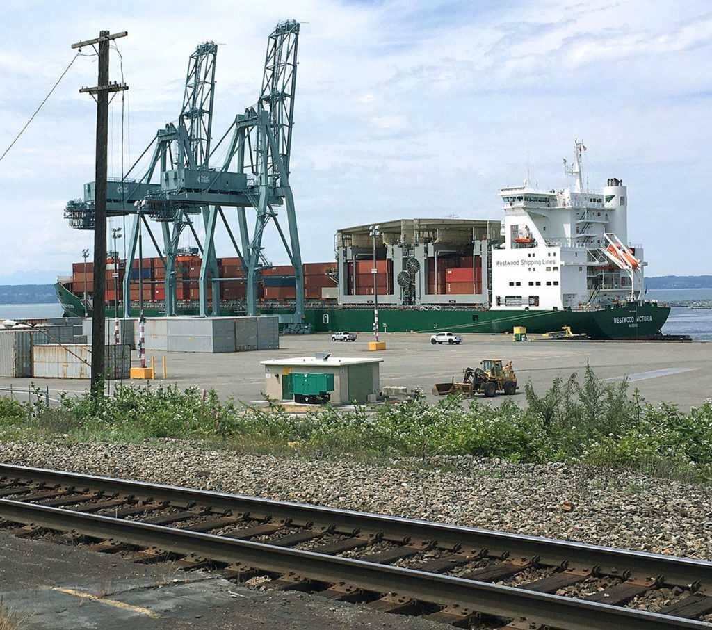 The container ship Westwood Victoria at the Port of Everett in June. (Janice Podsada / The Herald) 
