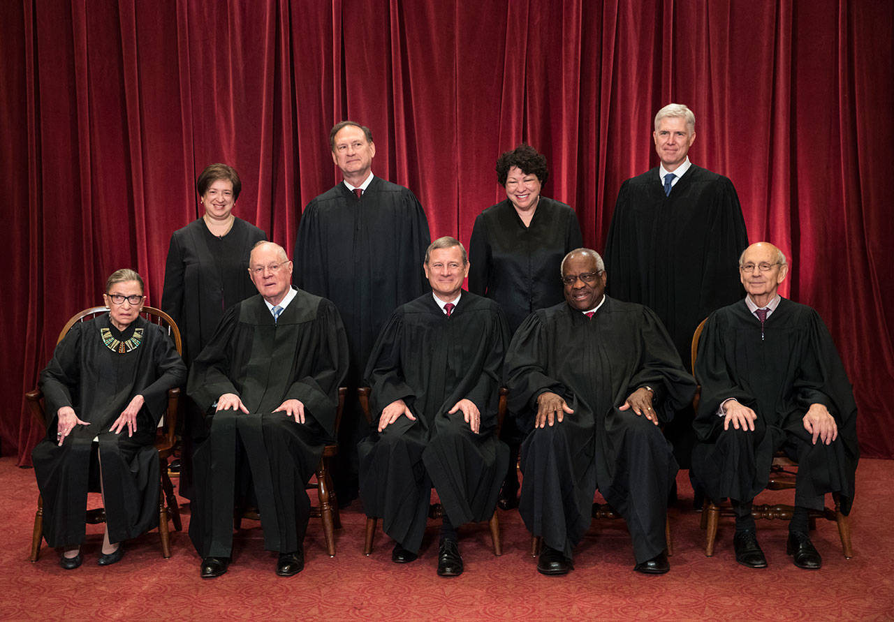 The justices of the U.S. Supreme Court gather for an official group portrait in June 2017. Seated, from left are Associate Justice Ruth Bader Ginsburg, Associate Justice Anthony Kennedy, Chief Justice John Roberts, Associate Justice Clarence Thomas, and Associate Justice Stephen Breyer. Standing, from left are, Associate Justice Elena Kagan, Associate Justice Samuel Alito Jr., Associate Justice Sonia Sotomayor, and Associate Justice Neil Gorsuch. The 81-year-old Kennedy said Tuesday that he is retiring after more than 30 years on the court. (J. Scott Applewhite/Associated Press File)