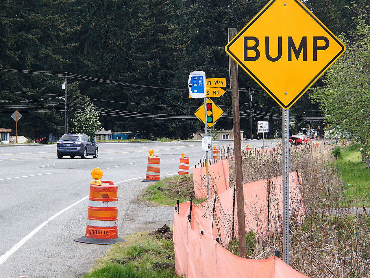 The bumpy drive along 128th Street SE (Highway 96) by McCollum Park in south Everett is getting smoothed out. But long-term fixes for this roller-coaster built over a former landfill are unlikely. (Herald photo)