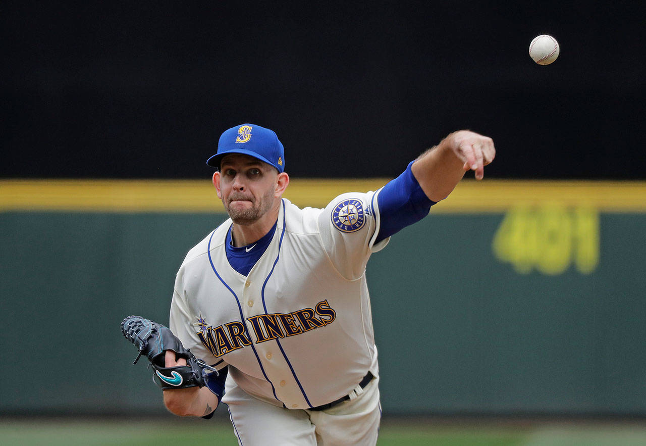 Seattle Mariners starting pitcher James Paxton struck out 11 Kansas City Royals in his eight innings of work Sunday. (AP Photo/Ted S. Warren)