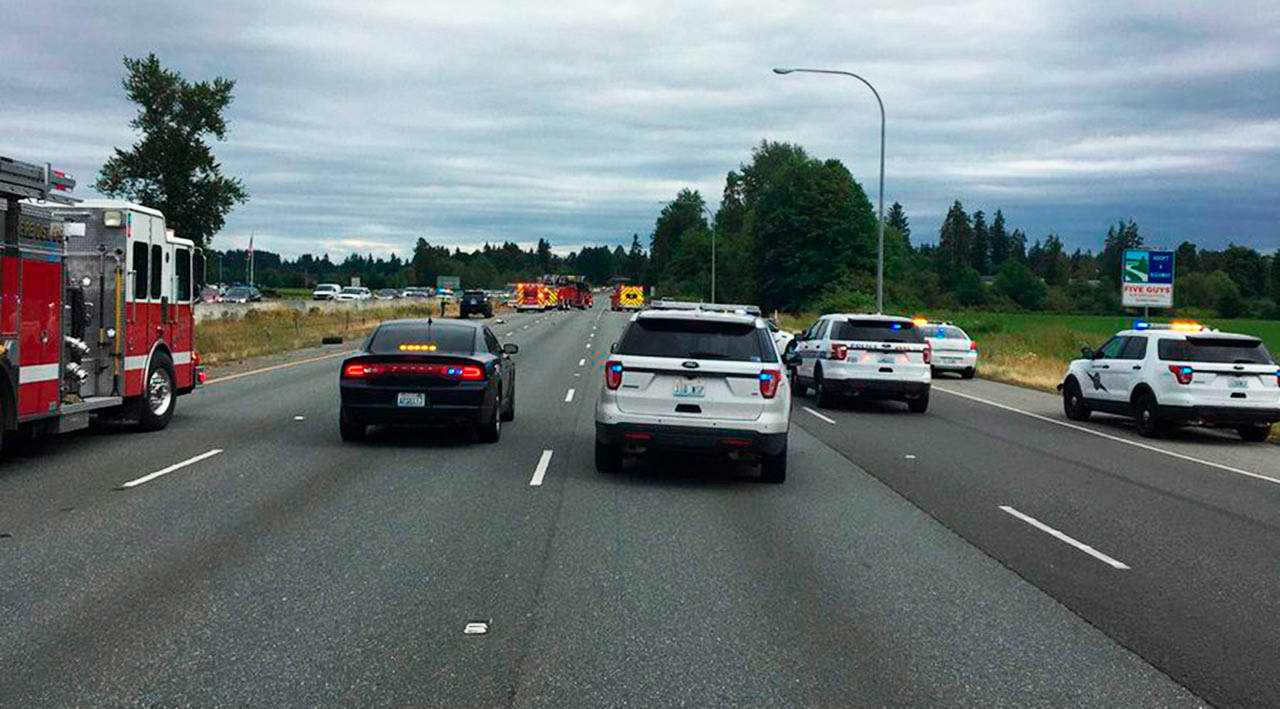 Law enforcement and emergency responders block the southbound lanes on I-5 near Marysville after a wrong-way driver caused a fatal crash Sunday. (Marysville Police Department)