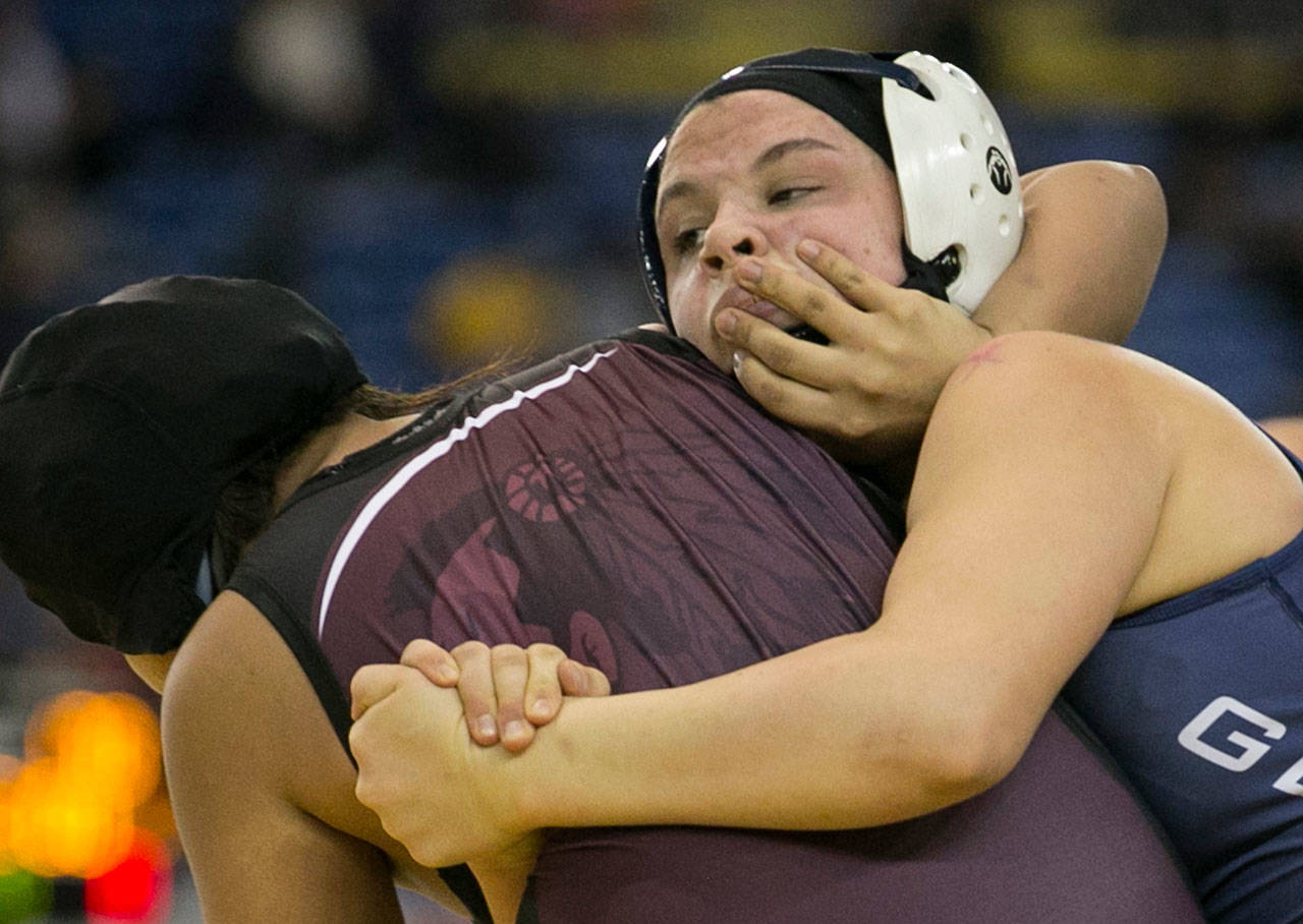 Kiley Hubby of Glacier Peak (right) is one of 10 Snohomish County wrestlers scheduled to compete this week at the Cadet/Junior National Championships in Fargo, North Dakota. (Kevin Clark / The Daily Herald)