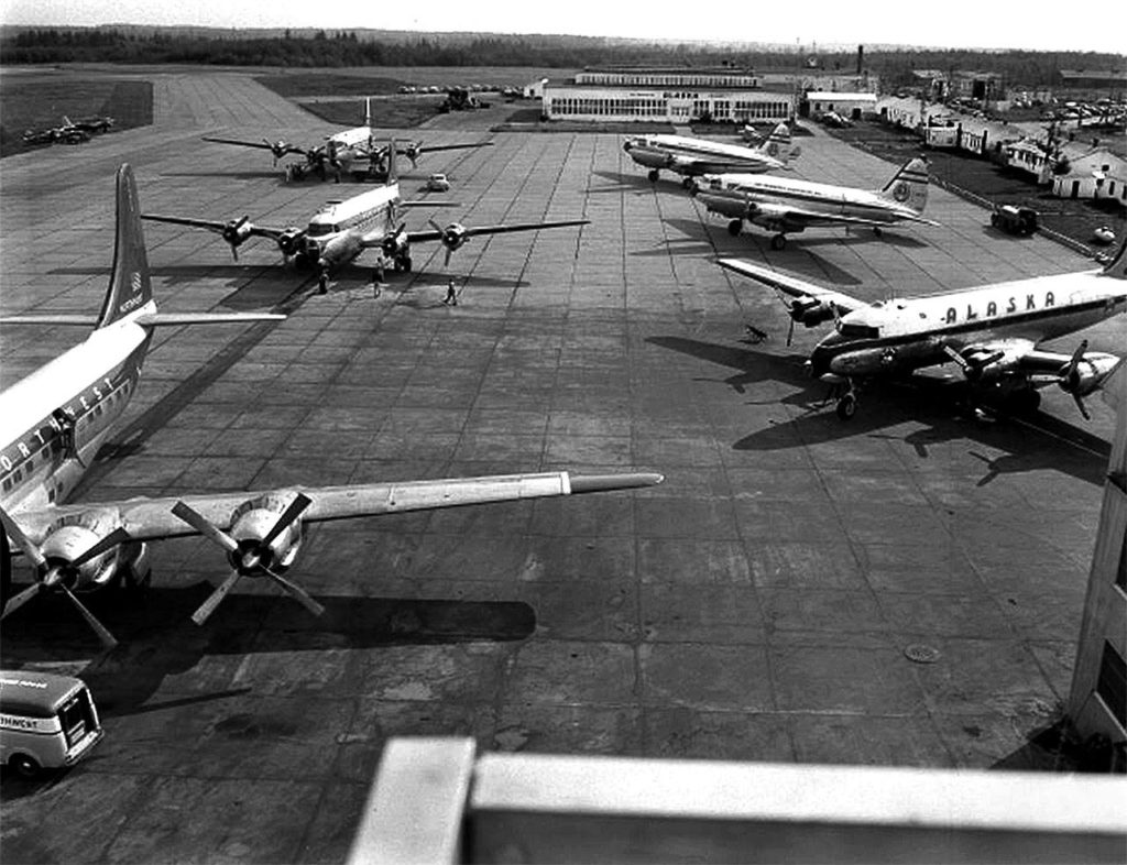 An Alaska Airlines plane and other aircraft are pictured outside Alaska’s maintenance and repair facility at Paine Field in 1951. The airline will soon offer commercial flights from Paine Field. (Ken Knudson / Everett Herald)
