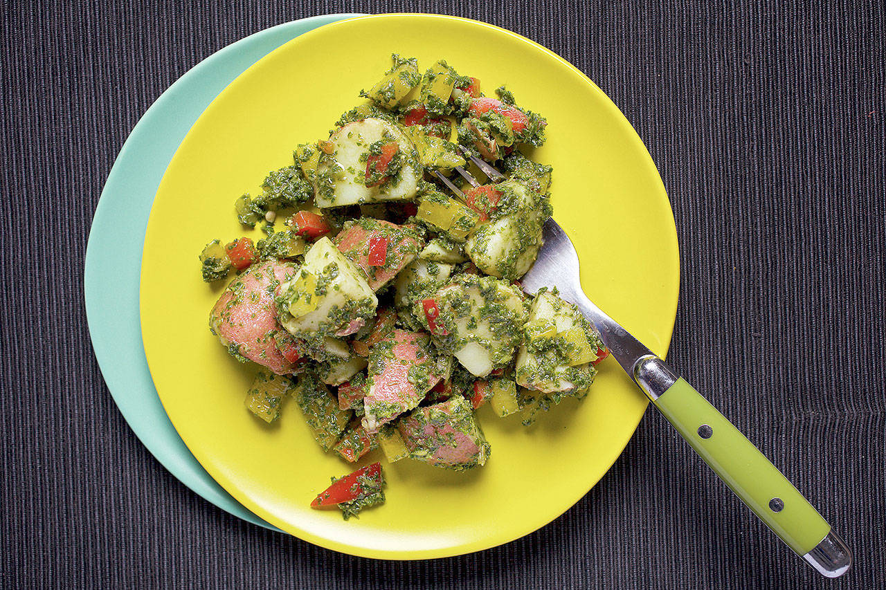 Potato salad with kale pesto is a fresh new approach to the summer side dish. (Photo by Deb Lindsey for The Washington Post)