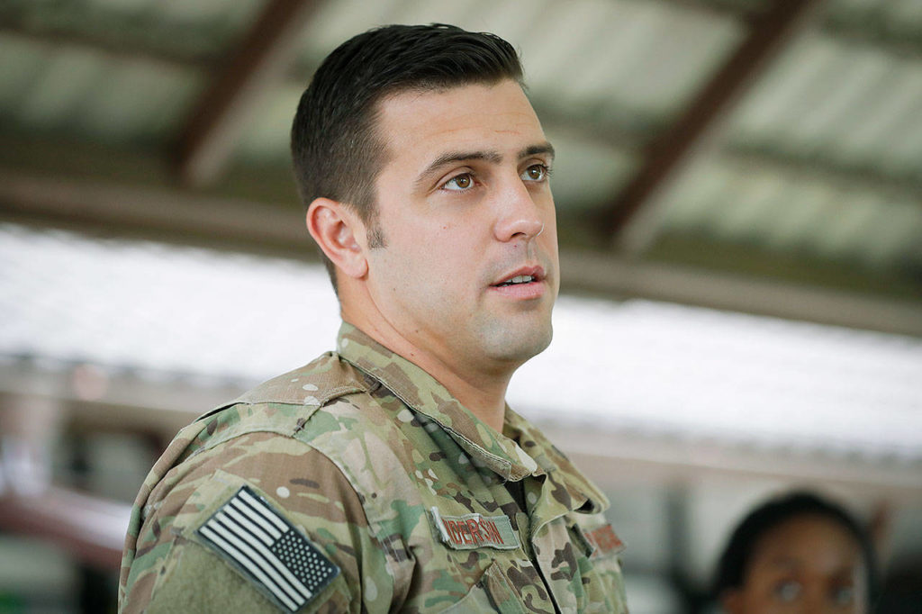 U.S. Air Force Master Sargent Derek Anderson talks about the risky operation of extracting boys trapped boys with their soccer coach in a cave in northern Thailand. (AP Photo/Vincent Thian) 
