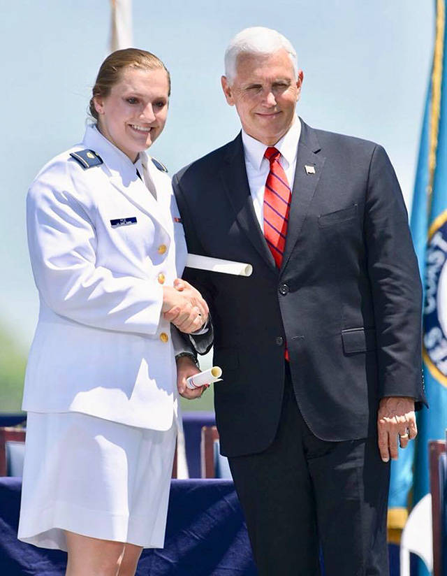 Vice President Mike Pence congratulates Ensign Megan Rice, of Snohomish, at the 2018 commencement ceremony at the U.S. Coast Guard Academy in New London, Connecticut. (Contributed photo)