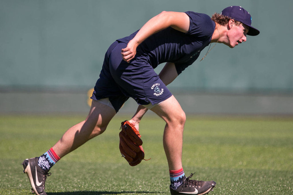 AquaSox pitcher Joey Gerber fields a ground ball Wednesday at Everett Memorial Stadium. (Kevin Clark / The Herald)
