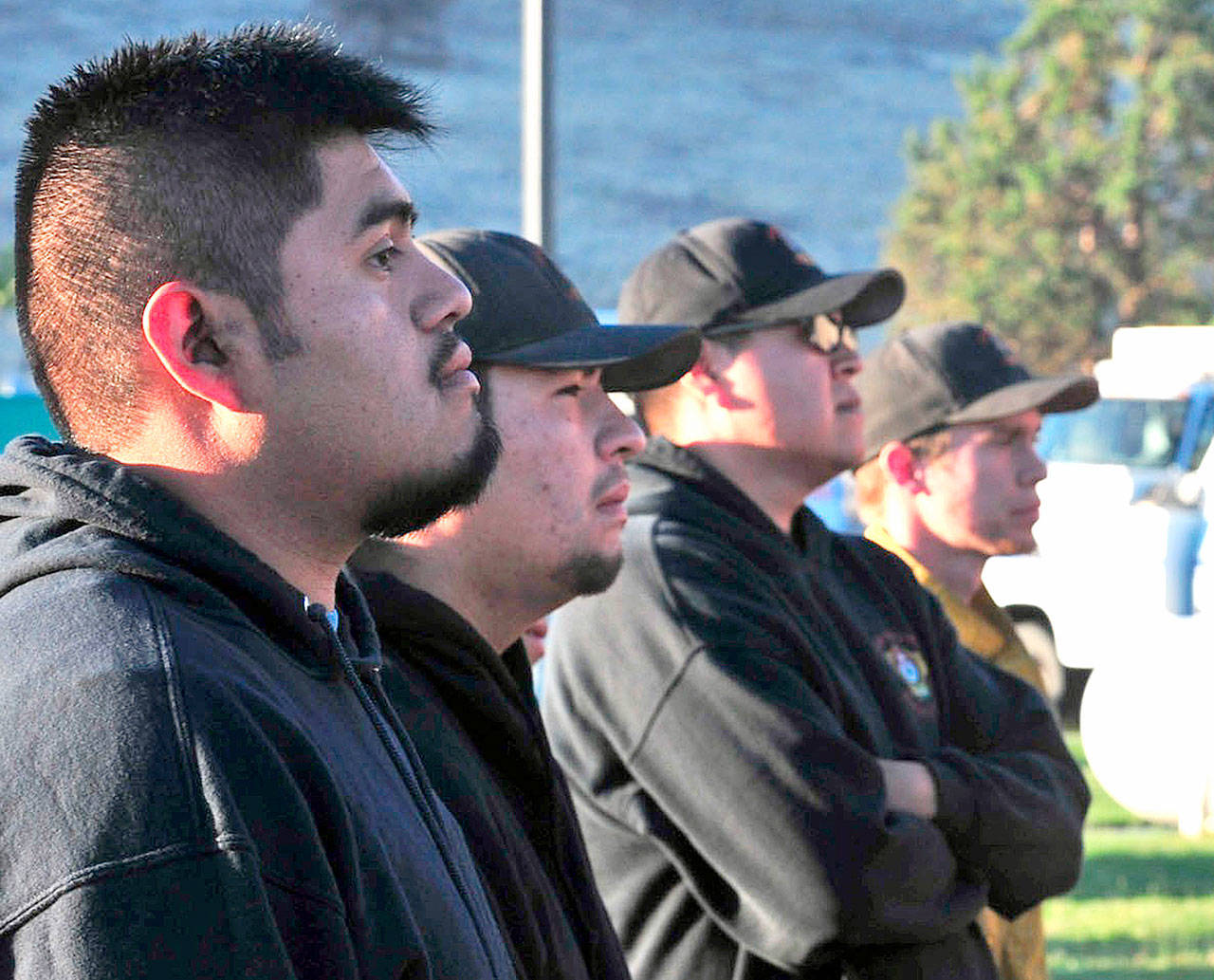 Members of the Warm Springs Hotshots stand at the ready in Warm Springs, Oregon, on July 1. Most Warm Springs Hotshots belong to one of the three Confederated Tribes of Warm Springs and live on the sparsely populated reservation about 100 miles southeast of Portland (AP Photo/Tom James)