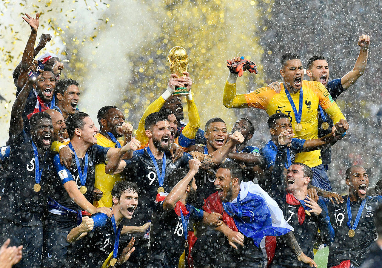 France goalkeeper Hugo Lloris lifts the trophy after France defeated Croatia 4-2 Sunday in the World Cup final in Luzhniki Stadium in Moscow. (AP Photo/Martin Meissner)