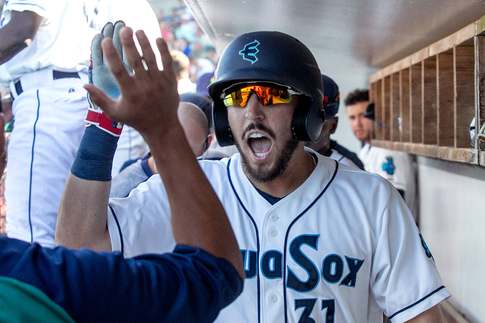 Aquasox’s Ryan Garcia celebrates his two run homer in the third inning against the Salem-Keizer Volcanos Sunday afternoon at Everett Memorial Stadium on July 15, 2018. (Kevin Clark / The Herald)