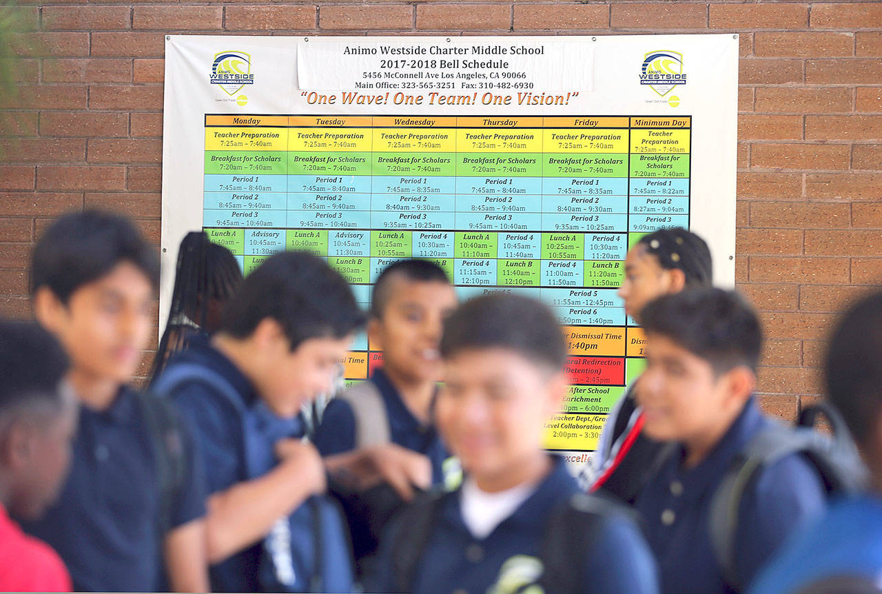 A chart shows 2017-18 school year periods and classes at Animo Westside Charter Middle School in the Playa Del Rey area of Los Angeles during a summer session to introduce new students. (AP Photo/Reed Saxon)