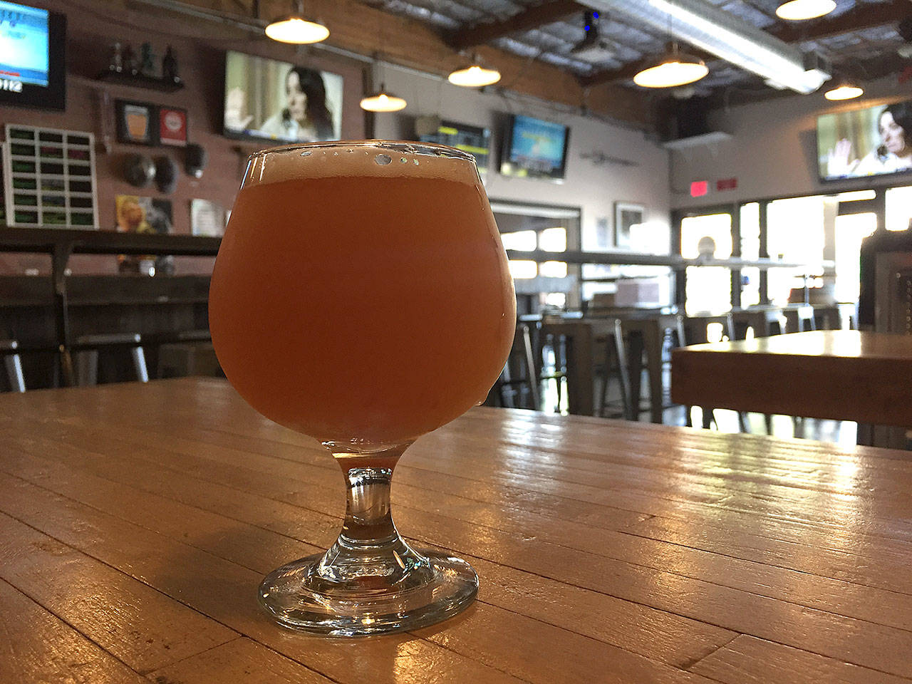 The Watermelon Kolsch is the latest collaboration beer from the Everett Mall Way trio: the Lazy Boy, Crucible and Middleton breweries. (Aaron Swaney)