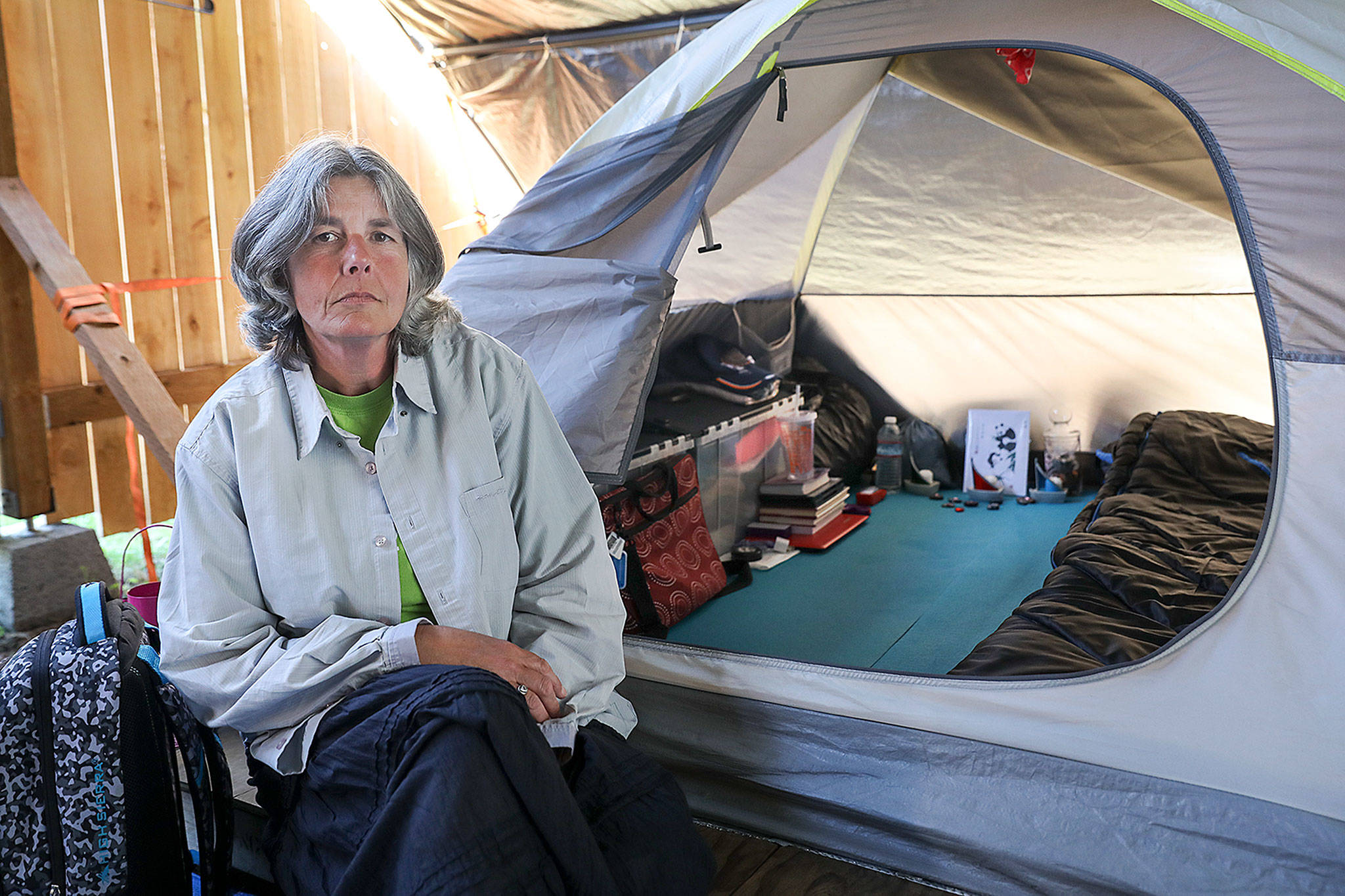 Donna Conner, a current resident of Shepherd’s Village, says a tiny home could better handle the rain and snow than her current tent shelter. (Lizz Giordano / The Herald)