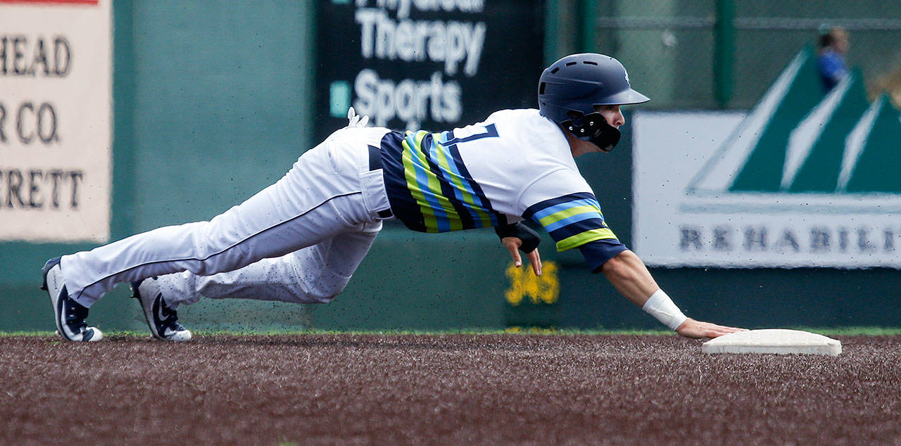 Everett’s Ryan Ramiz steals second base during Wednesday’s game at Everett Memorial Stadium. (Andy Bronson / The Herald)