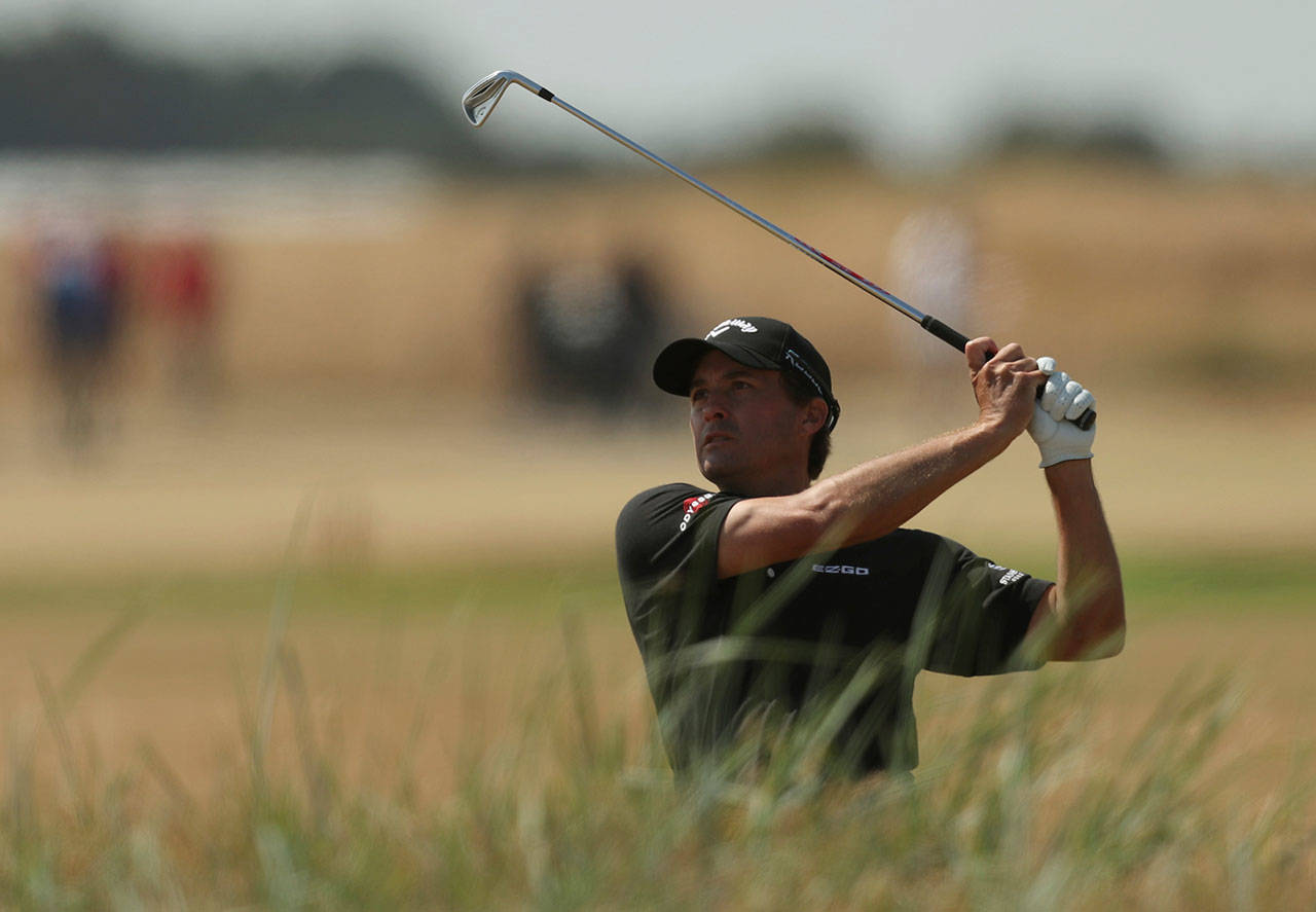 Kevin Kisner plays out of the rough on the 18th hole during the first round of the British Open on July 19, 2018, in Carnoustie, Scotland. (AP Photo/Jon Super)
