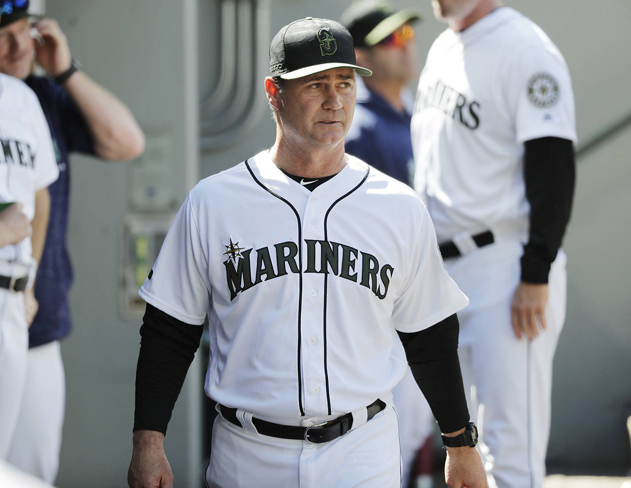 Seattle Mariners manager Scott Servais walks in the dugout during the eighth inning of a baseball game against the Minnesota Twins on May 27 in Seattle. (Ted S. Warren / Associated Press)