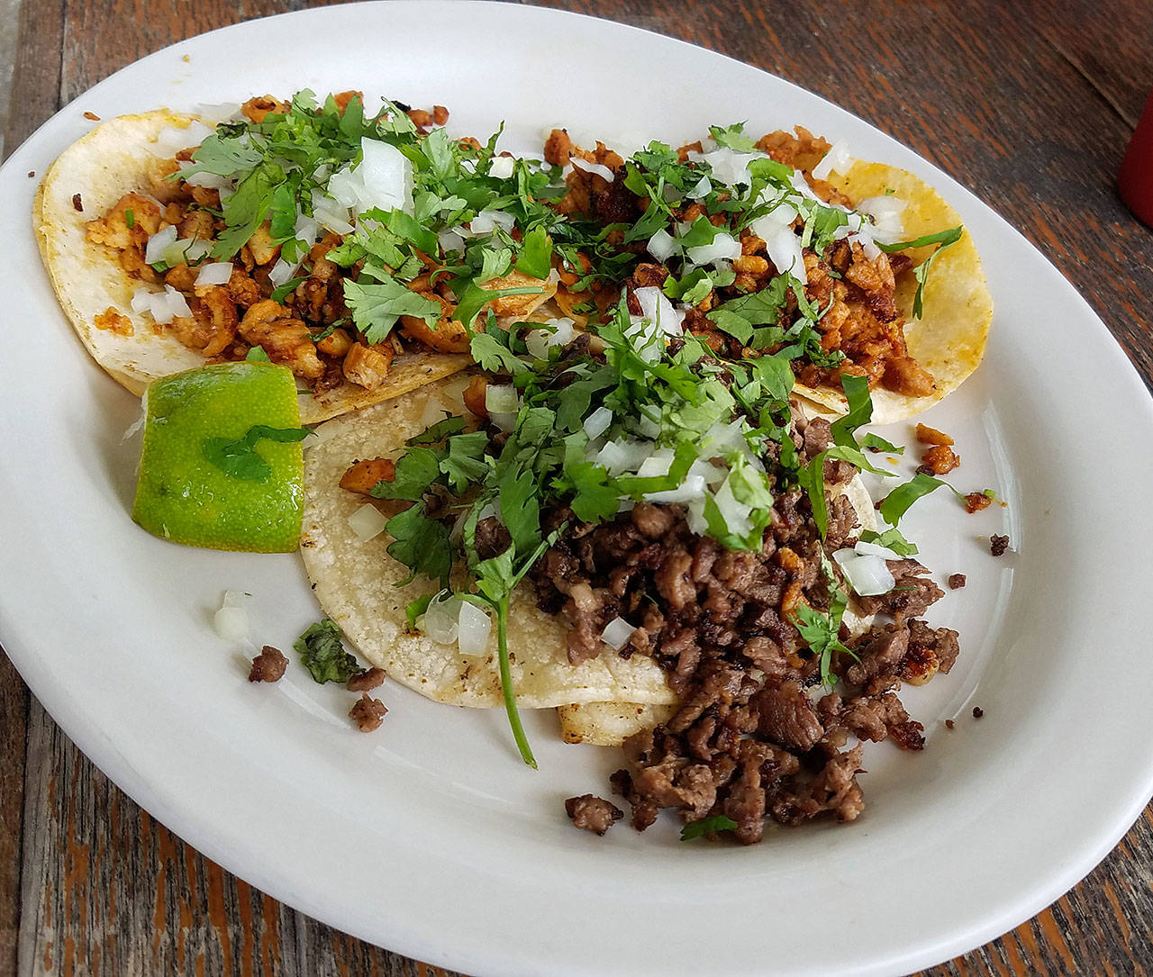 La Carreta offers a number of taco combinations, including these with chicken, beef and pork. Sharon Salyer/The Herald