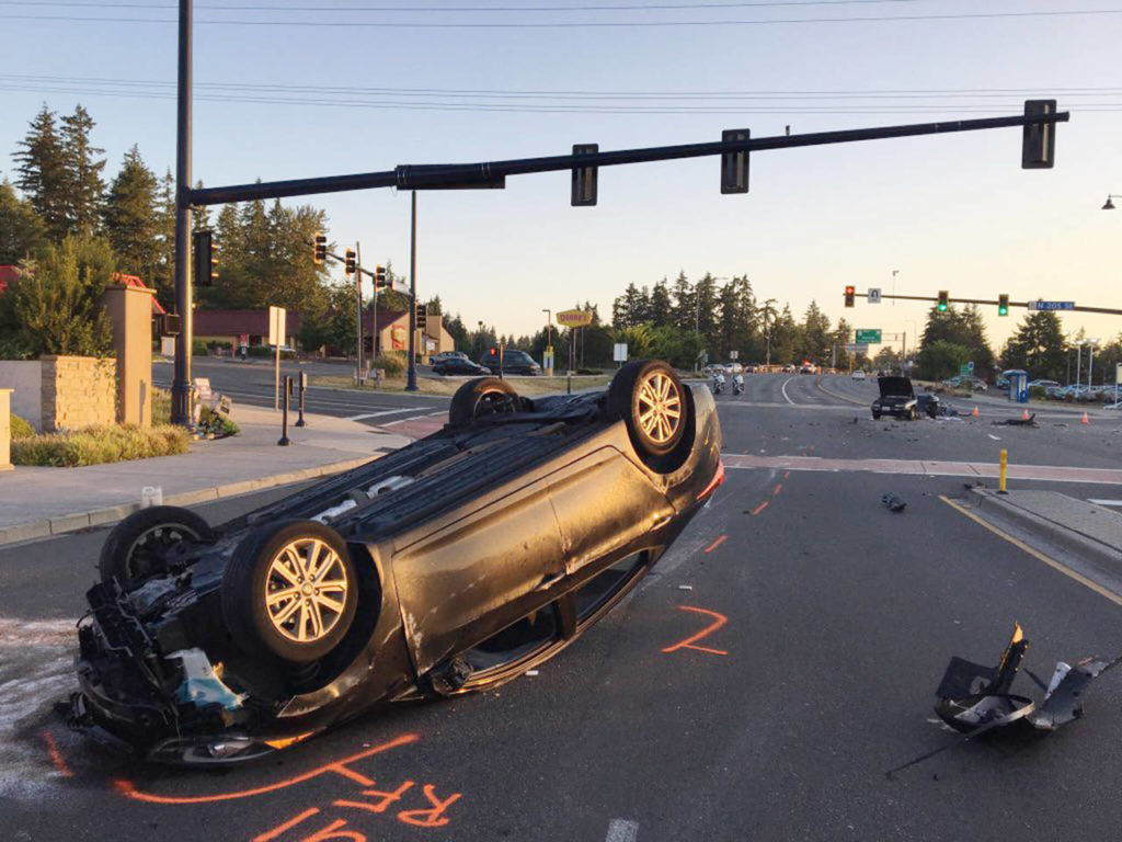 A Lynnwood woman was hospitalized with non-life-threatening injuries after a rollover collision on Highway 99 at the King-Snohomish County line. (Edmonds Police)
