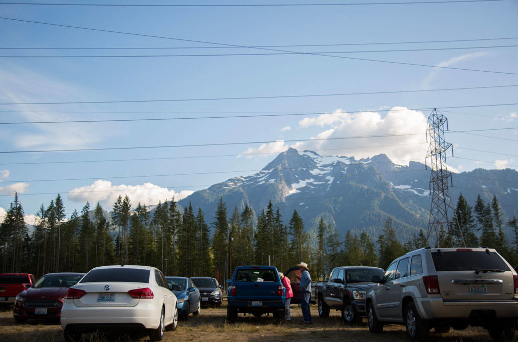 A couple gets out of their car to head into the music venue during the Darrington Bluegrass Festival on Saturday, July 21, 2018 in Darrington, Wa. (Olivia Vanni / The Herald)
A couple gets out of their car to head into the music venue during the Darrington Bluegrass Festival on Saturday, July 21, 2018 in Darrington, Wa. (Olivia Vanni / The Herald)
