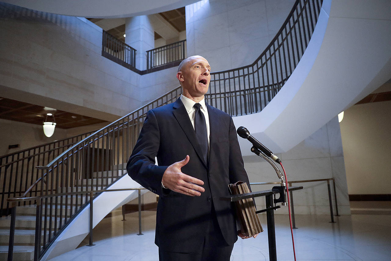 In a 2017 photo, Carter Page, a foreign policy adviser to Donald Trump’s 2016 presidential campaign, speaks with reporters following a day of questions from the House Intelligence Committee, on Capitol Hill in Washington. (AP Photo/J. Scott Applewhite, File)