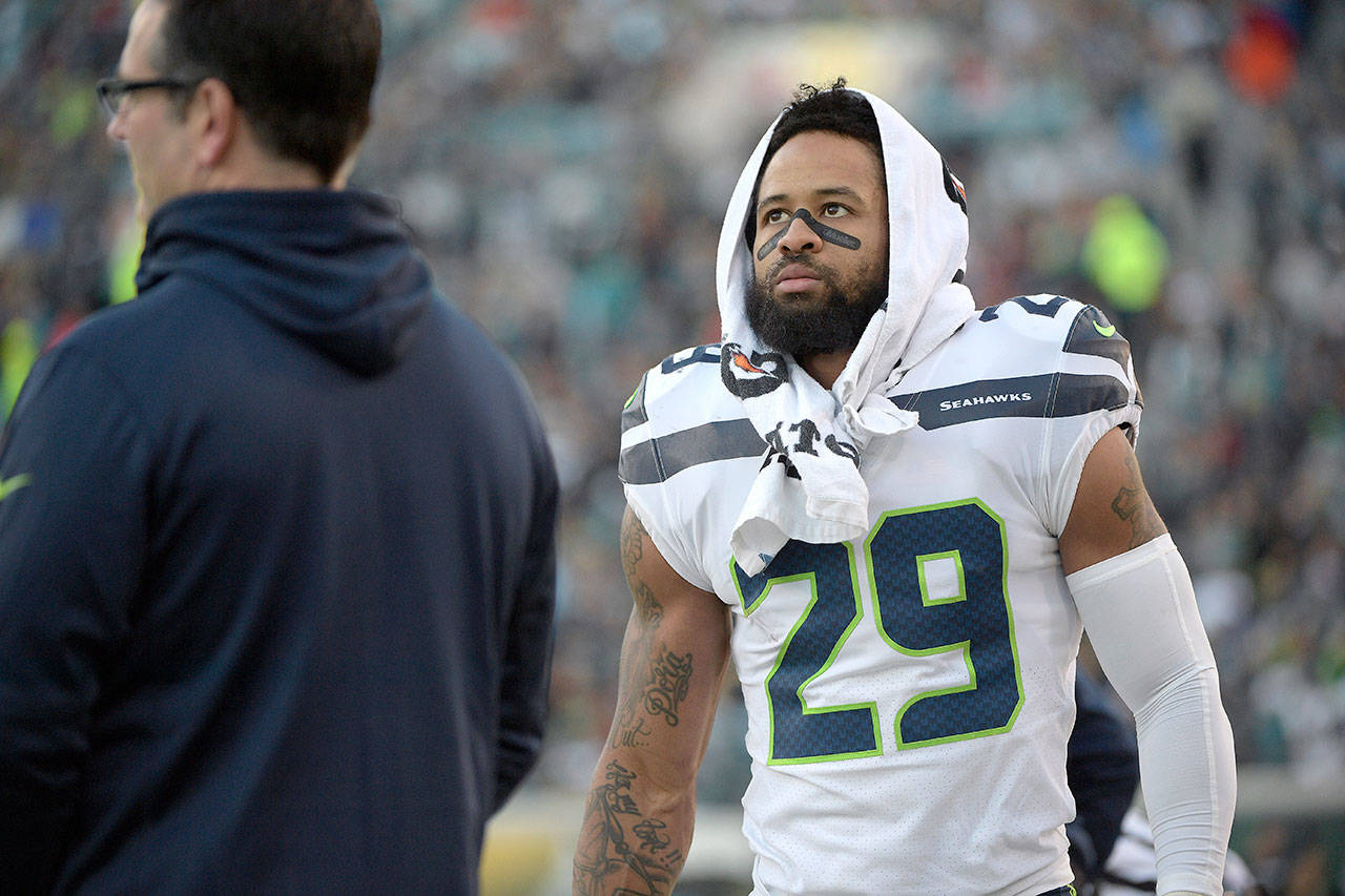 Seattle’s Earl Thomas watches from the sideline during the Seahawks’ game at Jacksonville on Dec. 10, 2017 in Jacksonville, Florida. It’s looking more and more likely that Thomas will not report to training camp with his Seattle teammates Wednesday. (AP Photo/Phelan M. Ebenhack