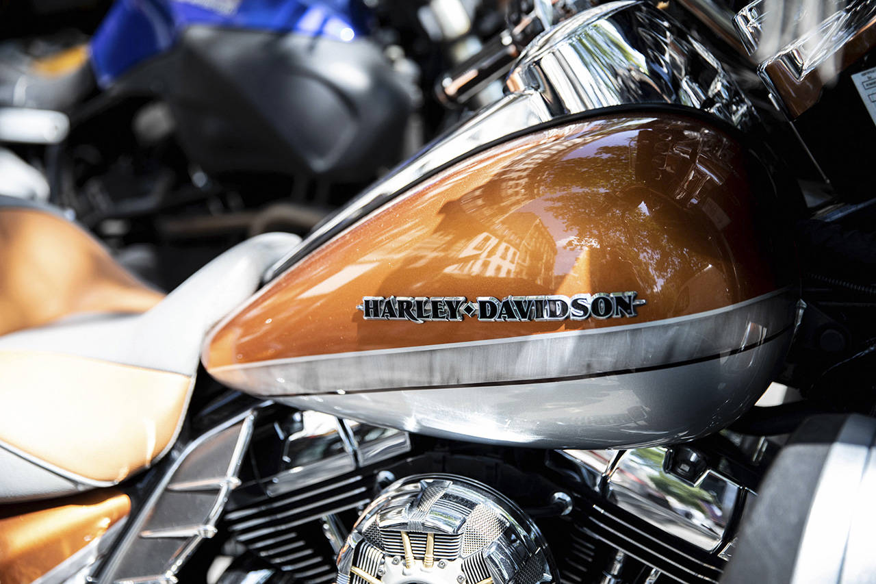 A Harley-Davidson Inc. badge sits on a motorcycle fuel tank outside the company’s store in Paris on June 28. (Christophe Morin/Bloomberg)