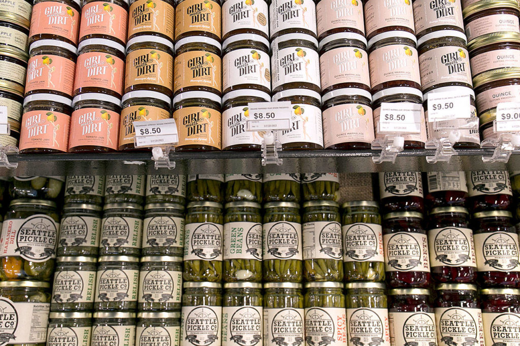 Local craft preserves on display at Farms & Market. (Kevin Clark / The Herald)
