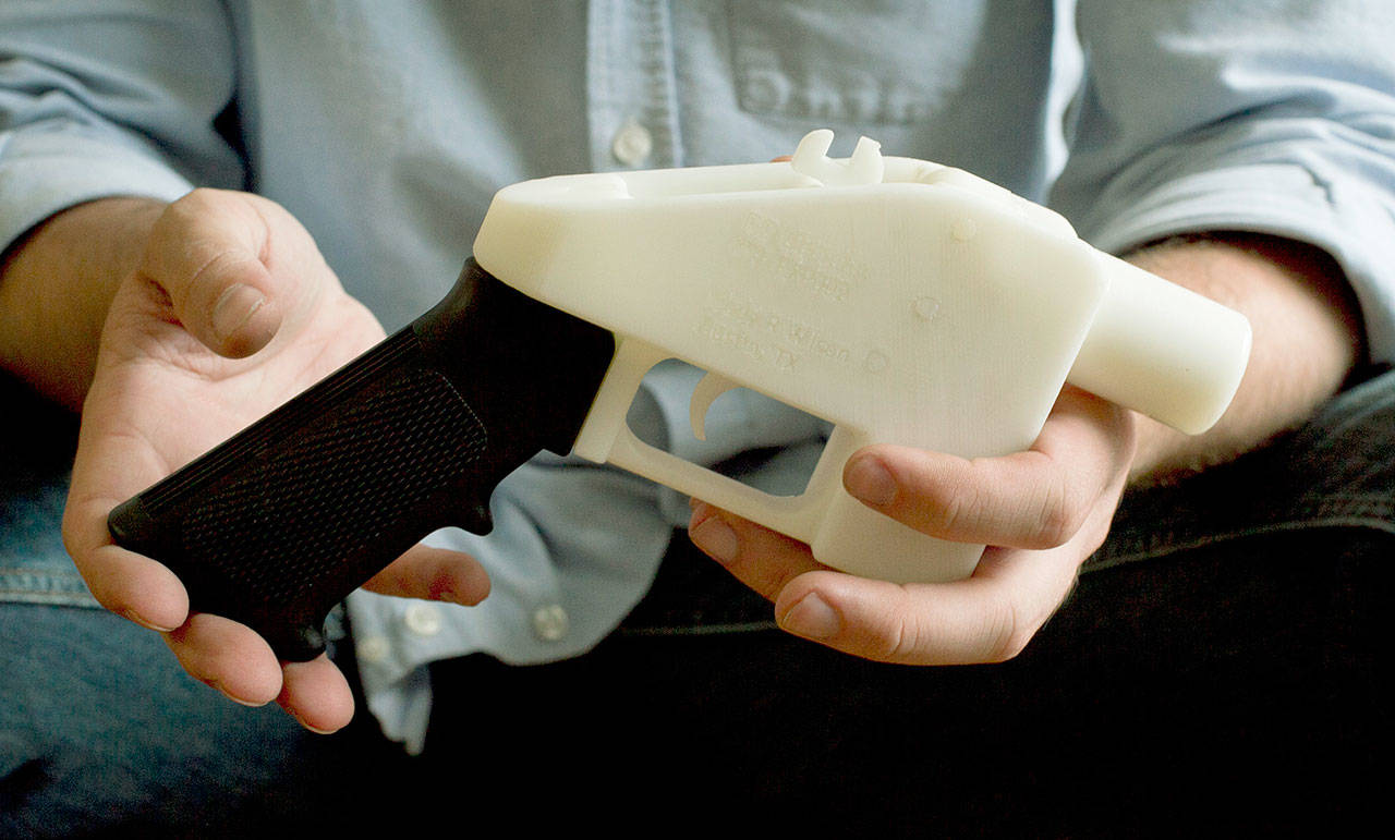A plastic pistol that was completely made on a 3D-printer at a home in Austin, Texas, is shown in this May 10, 2013 photo. A coalition of gun-control groups has filed an appeal in federal court seeking to block a recent Trump administration ruling that will allow the publication of blueprints to build a 3D-printed firearm. (Jay Janner/Austin American-Statesman via AP, File)
