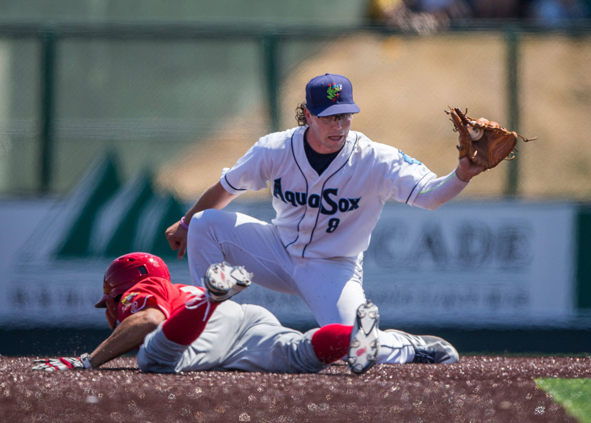 Aquasox’s Connor Hoover attempts to get Vancouver’s Tanner Kirwer out at second base during the game at Everett Memorial Stadium on Thursday, July 26, 2018 in Everett, Wa. (Olivia Vanni / The Herald)
