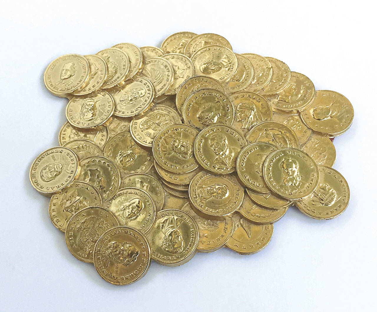 This 5½-inch wide pile of coins is a paperweight, probably first made in the 1960s. It was a popular gift for good customers and executives who were in financial businesses. Some are being sold online for about $40 to $50. (Cowles Syndicate Inc.)