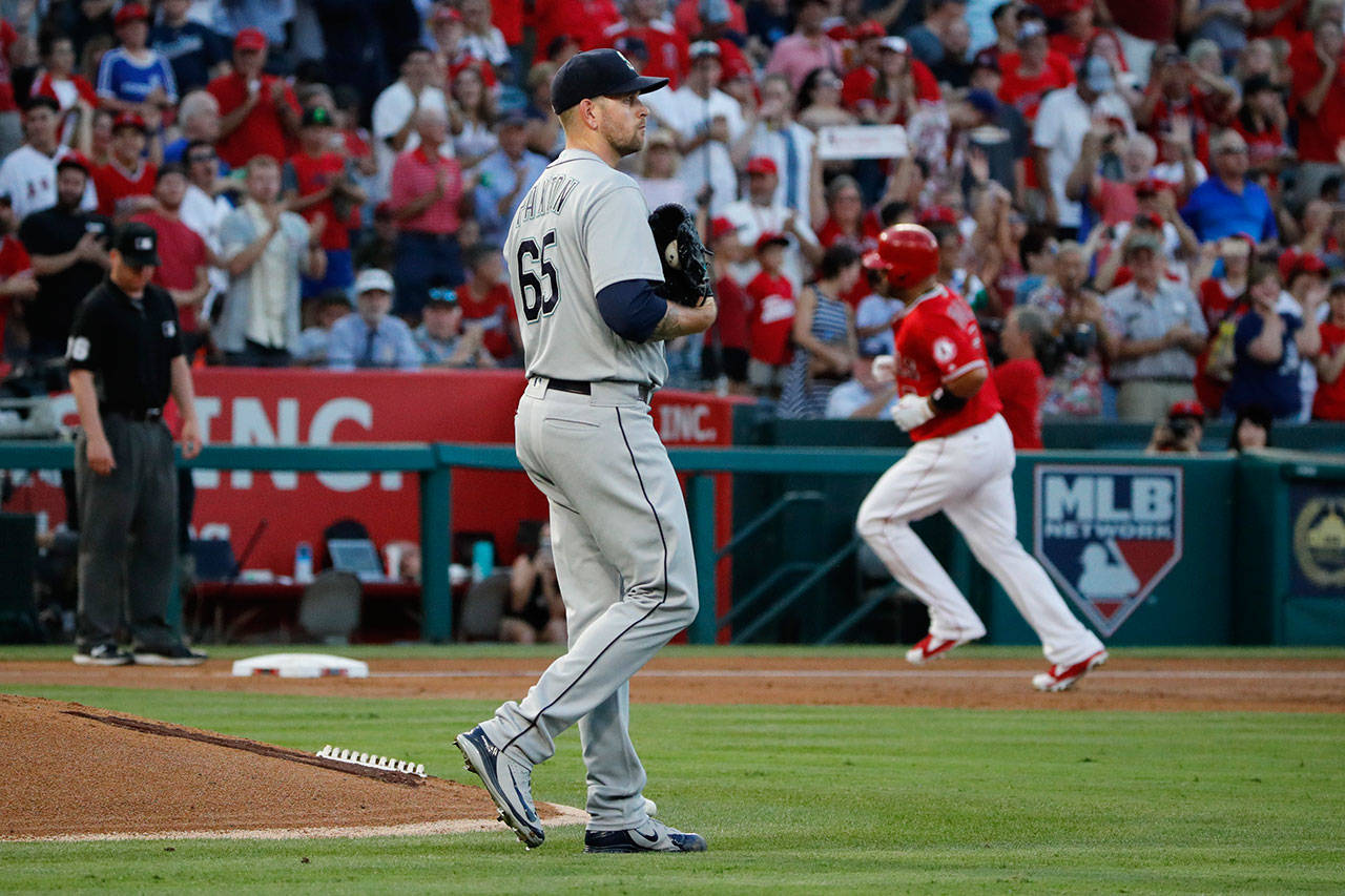 Seattle’s James Paxton reacts after giving up a home run to Los Angeles’ Albert Pujols in the first inning of a July 12 game in Anaheim, Calif. (AP Photo/Jae C. Hong)