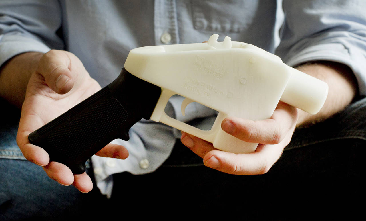 This plastic pistol was completely made on a 3D-printer at a home in Austin, Texas. (Jay Janner/Austin American-Statesman via AP, File)