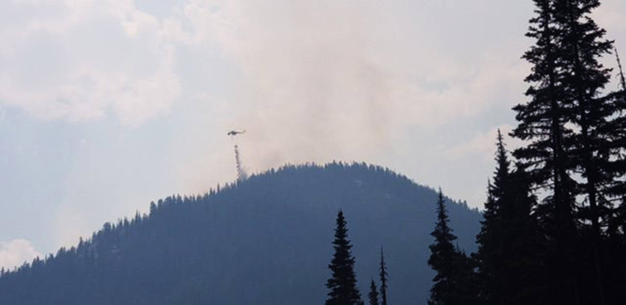 Fire retardant is being dropped near the Cutthroat Lake Trailhead 30 miles west of Winthrop. (Trooper Brian Moore/Washington State Patrol)