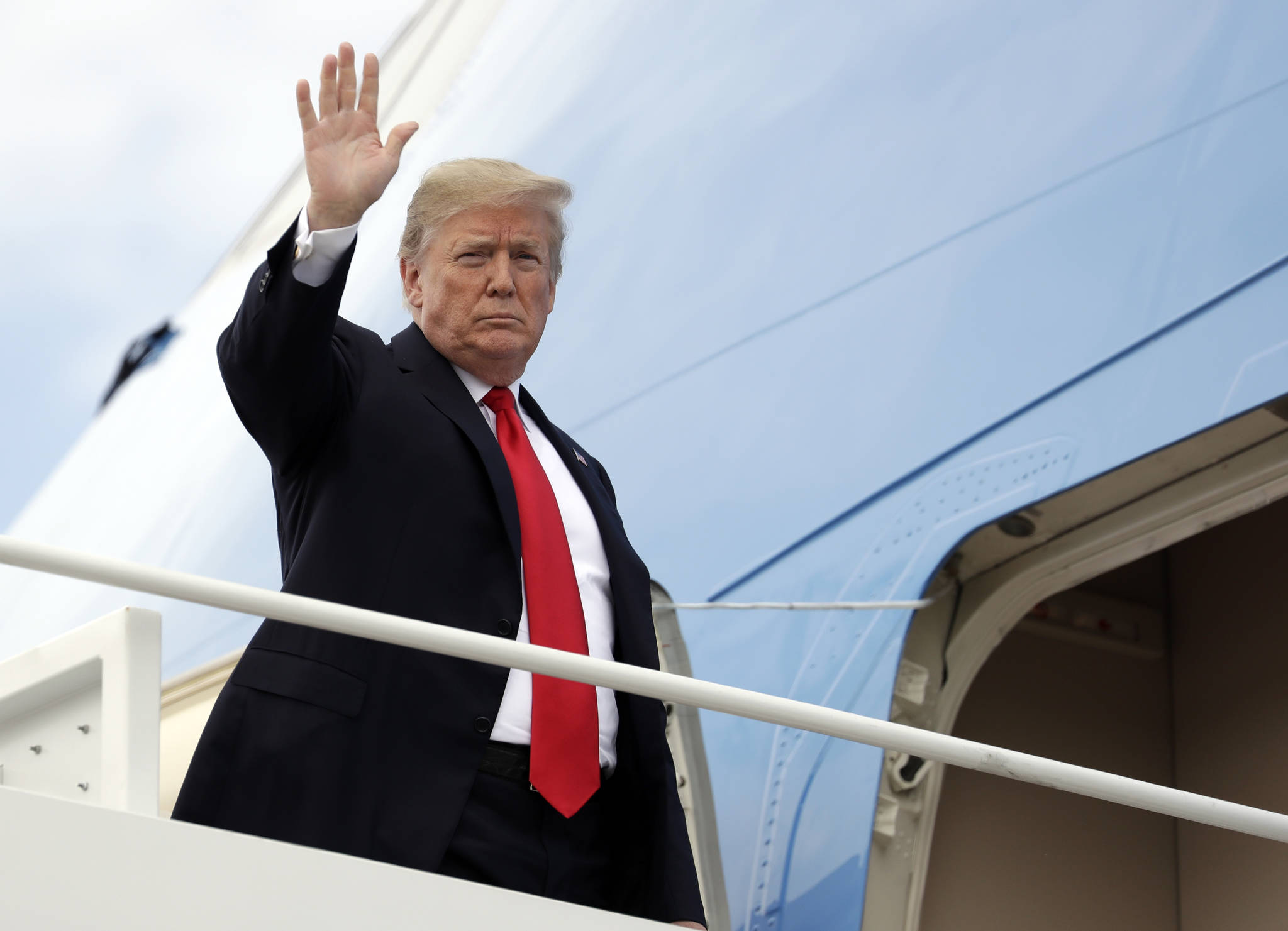 Promoting voter ID, Trump says ID needed to buy groceries