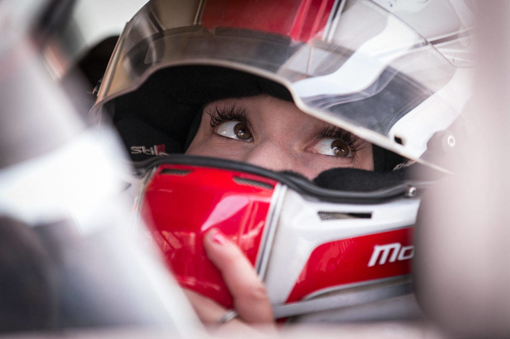 Molly Helmuth gets last-minute instructions from her crew chief prior to time trials on July 28 at Monroe’s Evergreen Speedway. (Kevin Clark / The Herald)
