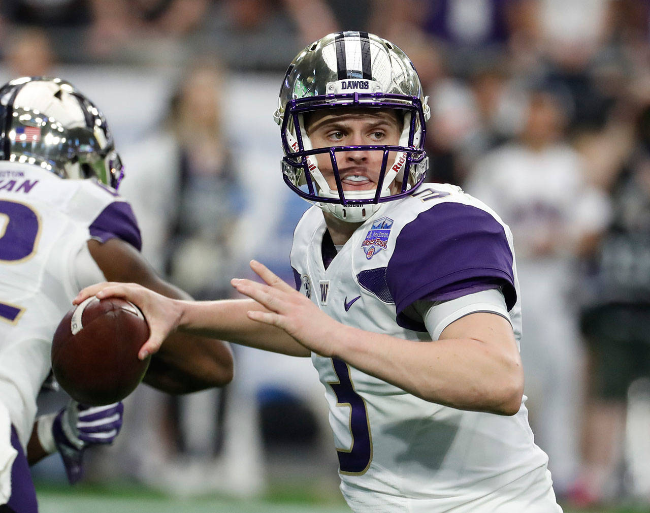 Washington quarterback Jake Browning (3) throw a pass against Penn State during the Fiesta Bowl on Dec. 30, 2017, in Glendale, Ariz. (AP Photo/Rick Scuteri)
