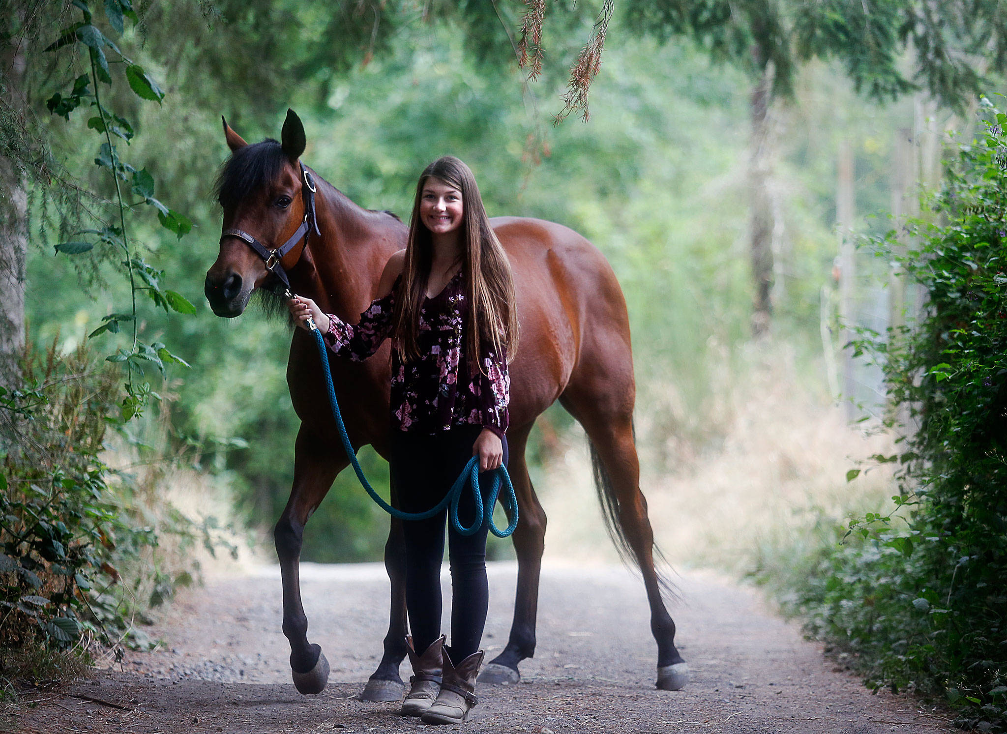Alexis Eacret is a champion horse rider and just recently won a national title. She dearly loves her 12-year-old quarterhorse, Brody, whom she has had for three years. (Dan Bates / The Herald)