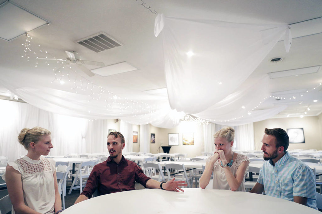 From left, Kassie Bevier, fiance Nicholas Lewan, Krissie Bevier and fiance Zack Lewan talk about their relationships and growing up as identical twins. (Nikos Frazier /Jackson Citizen Patriot via AP)
