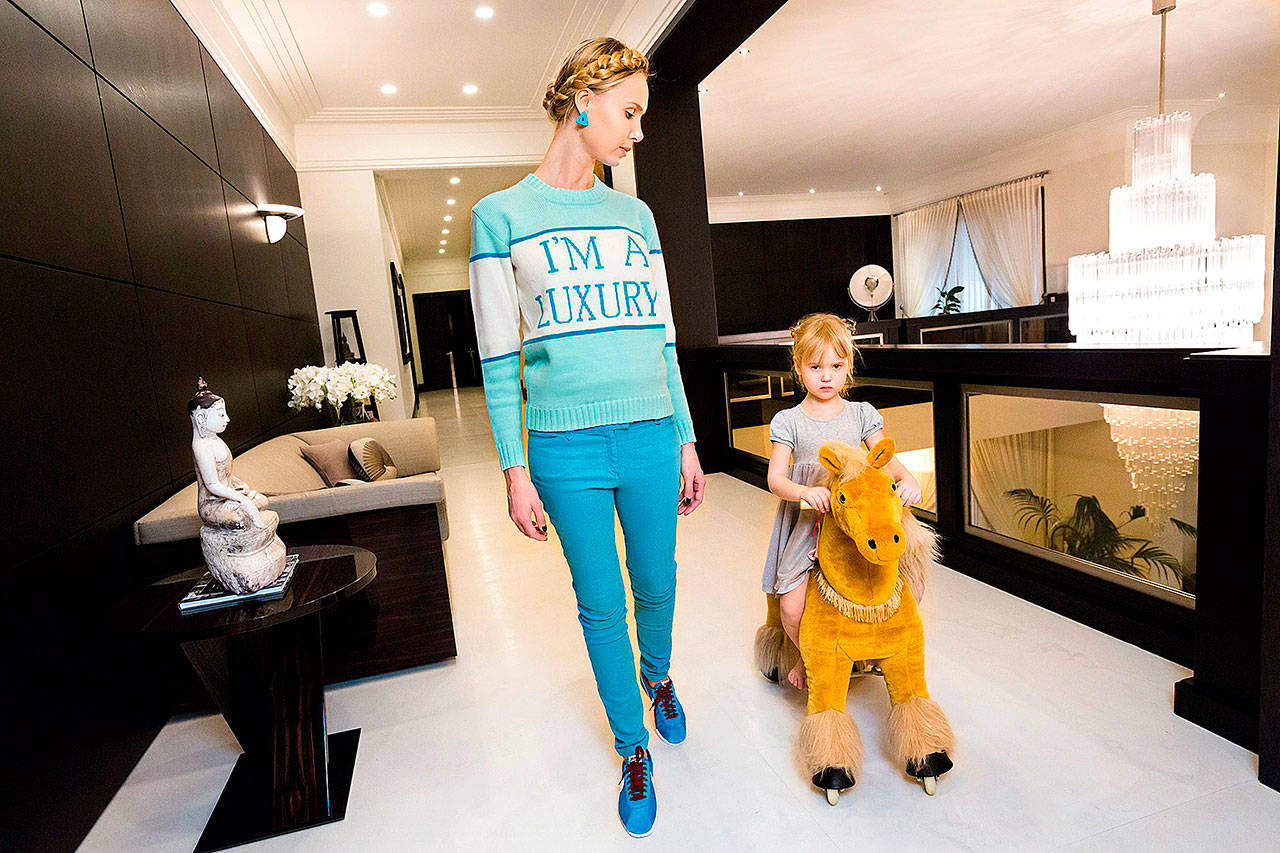 Ilona, seen here at home with her daughter, Michelle, 4, in Moscow, is interviewed in the documentary “Generation Wealth.” (Lauren Greenfield/Institute)