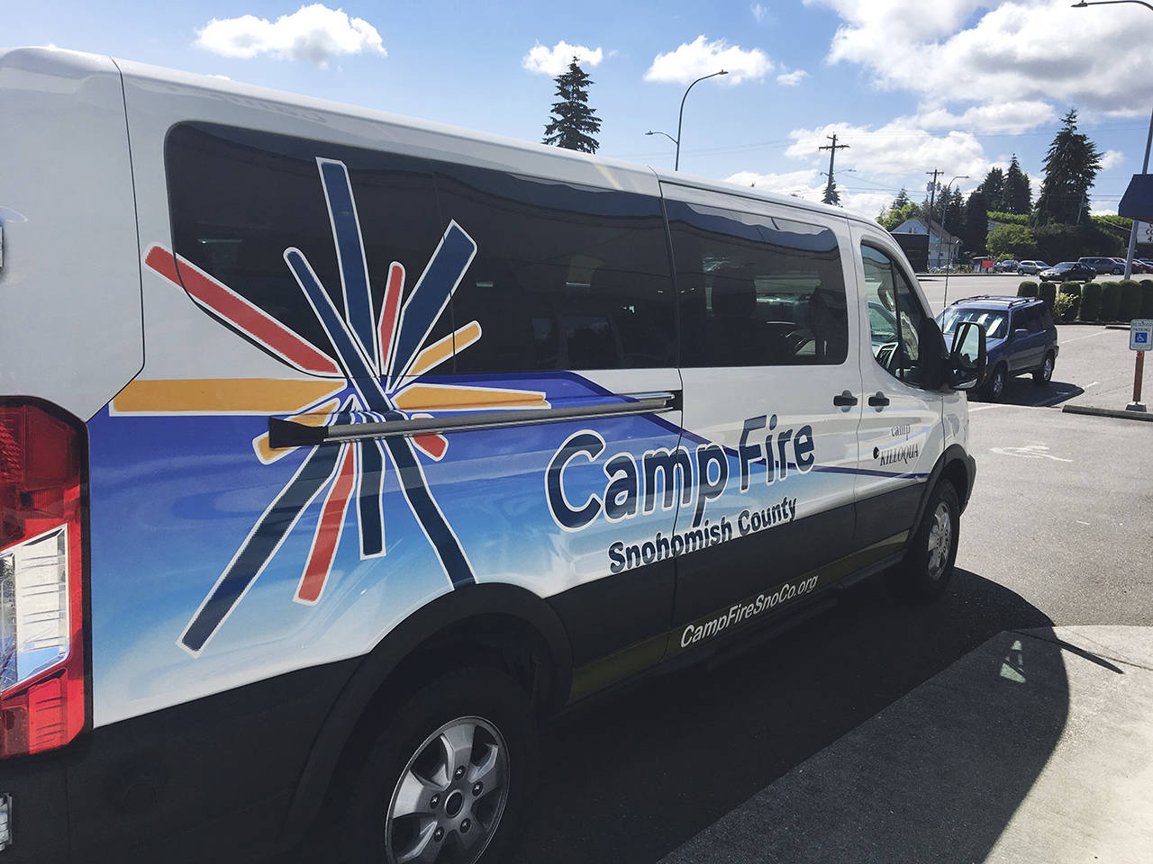 Camp Fire Snohomish County was able to purchase a brand-new 12-passenger van thanks to a $40,000 donation from the Employees Community Fund of Boeing Puget Sound. (Contributed photo)