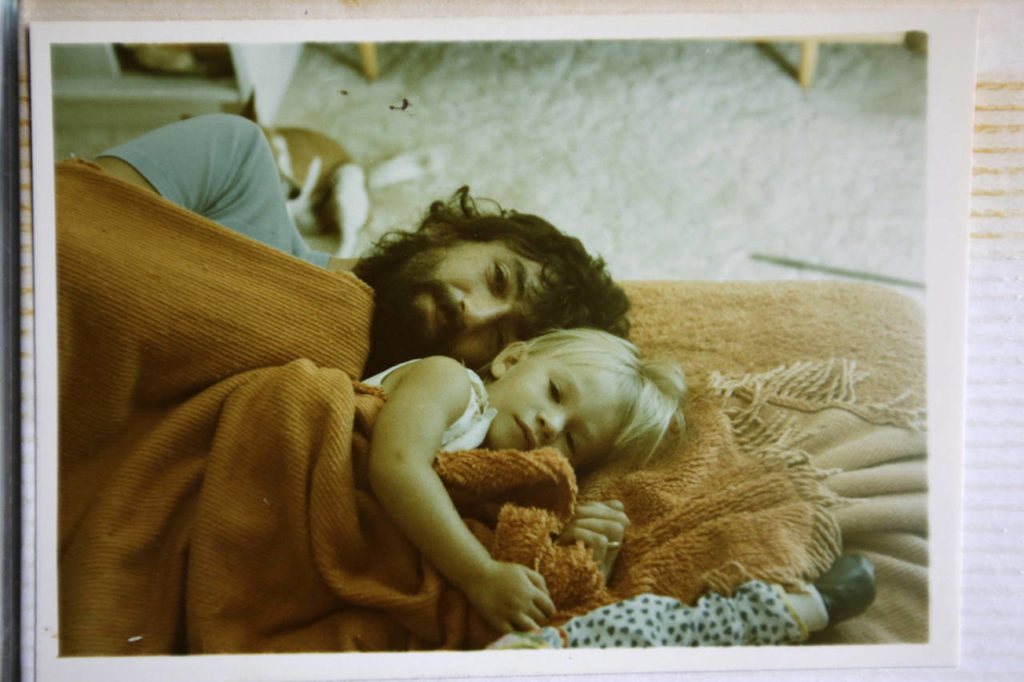 This 1979 shows Peter Peacock with his elder daughter, Melanie, as they lay on the floor, in Melbourne, Australia. (Courtesy Peter Peacock via AP)
