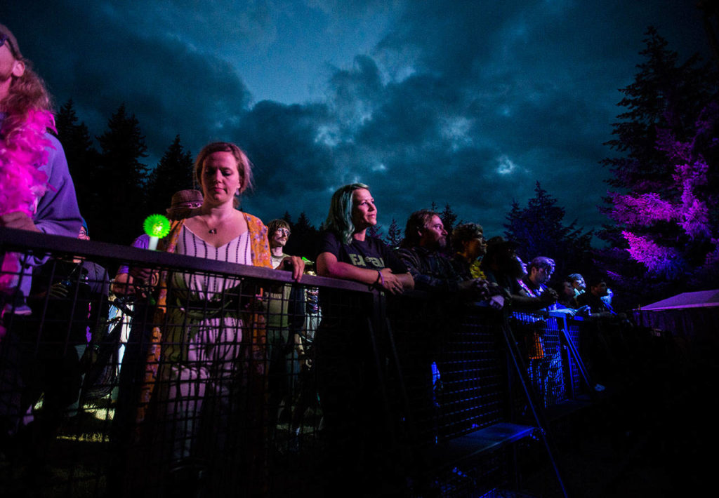 Summer Meltdown attendees watch Twiddle perform at the Summer Meltdown on Thursday in Darrington. (Olivia Vanni / The Herald)
